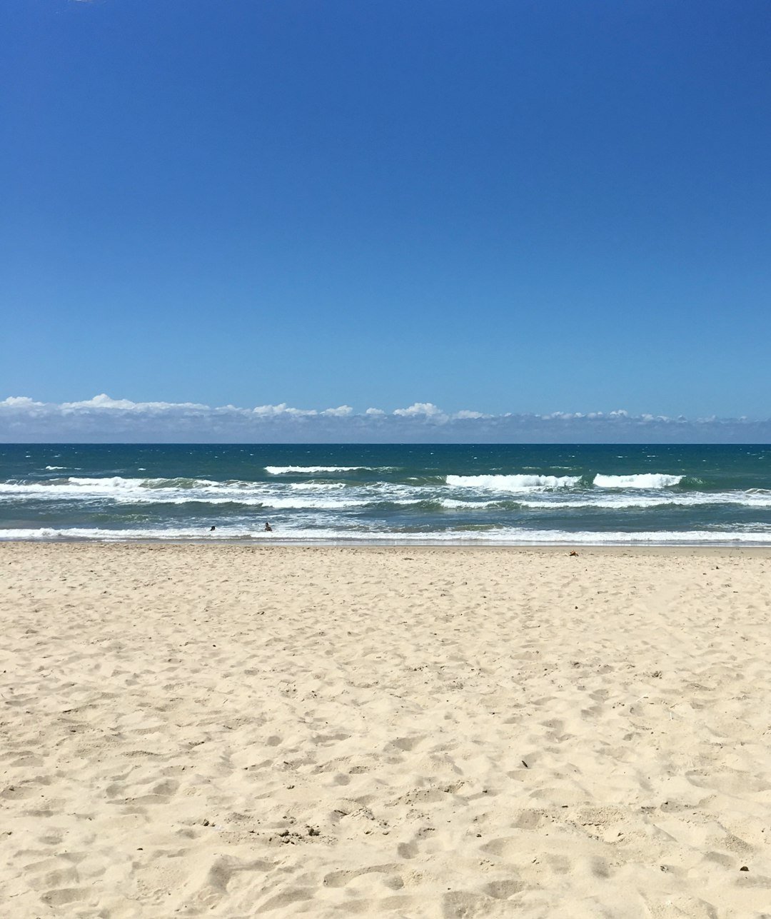blue sea under blue sky during daytime
