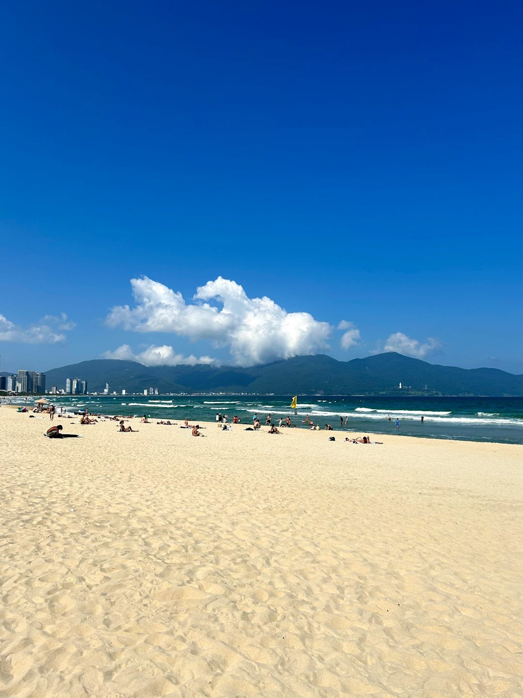 a beach with a lot of people on it