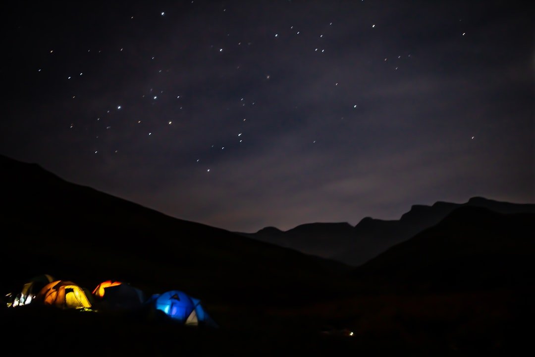 blue tent over star sky