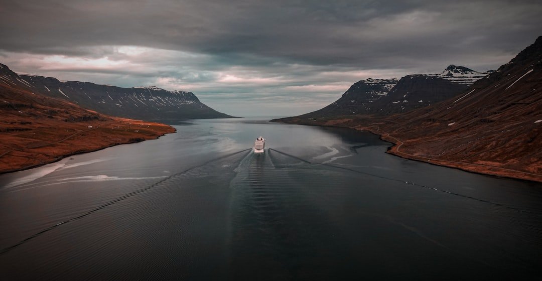 a boat traveling through a large body of water