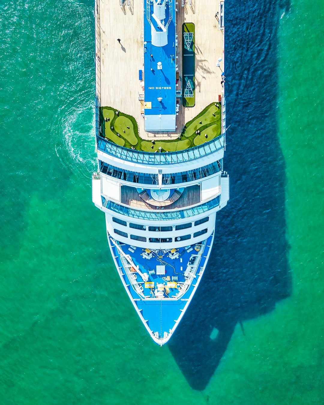 An aerial view of a cruise ship in the ocean