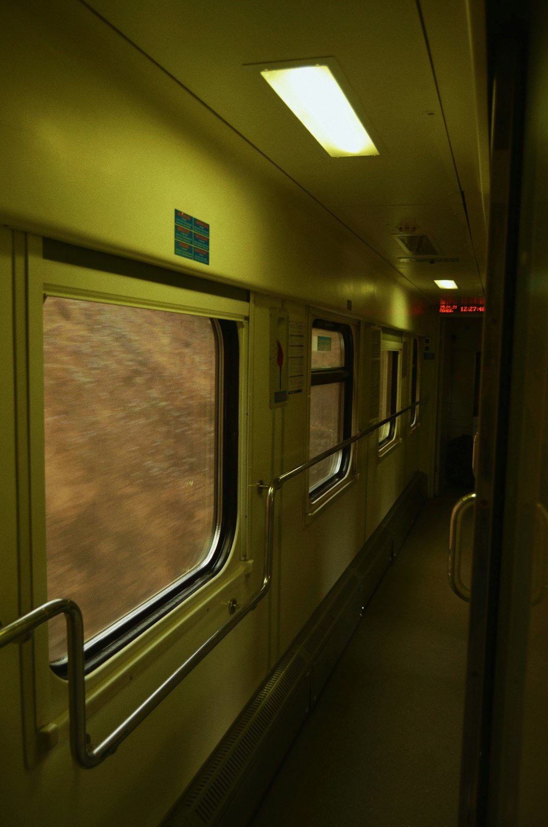 a view of a train from the inside of the car