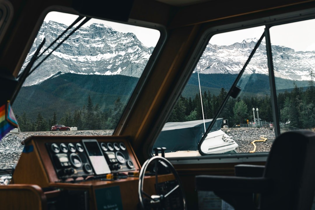 A view of the mountains from inside a boat