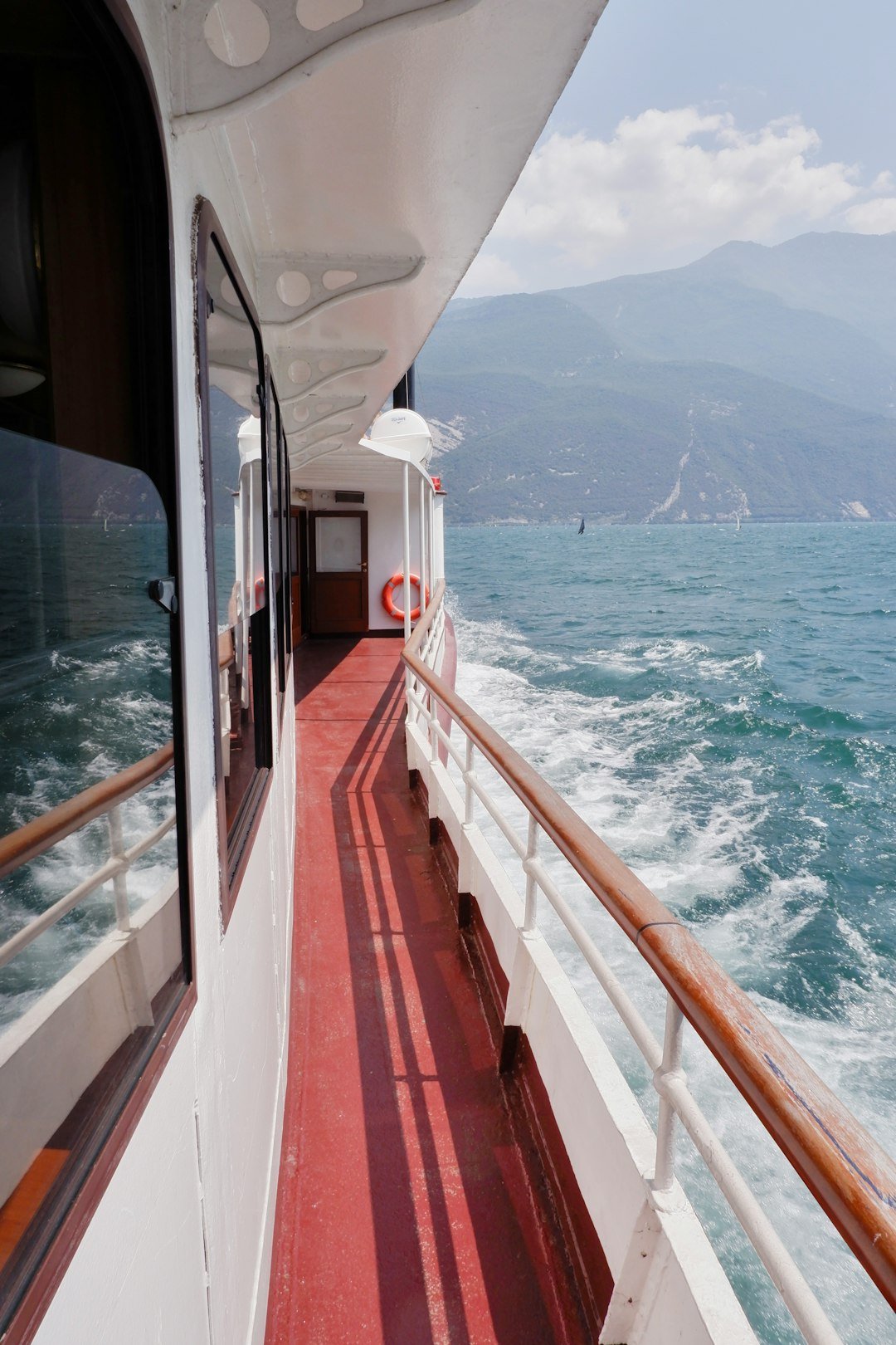 A view of the back of a boat on the water