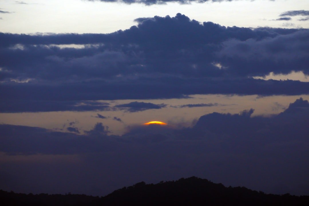 silhouette of mountains during sunset