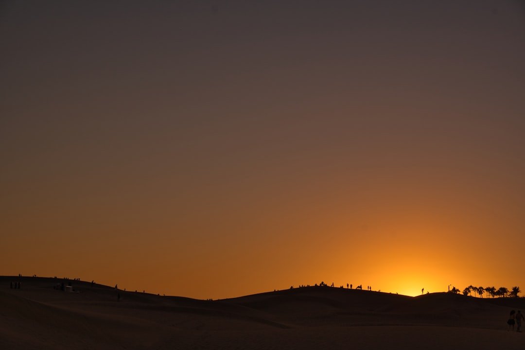 a sunset over a body of water