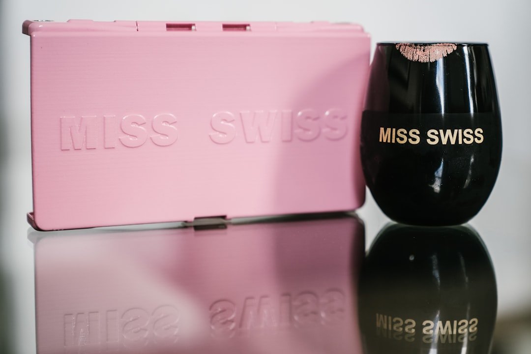 pink and black leather bag