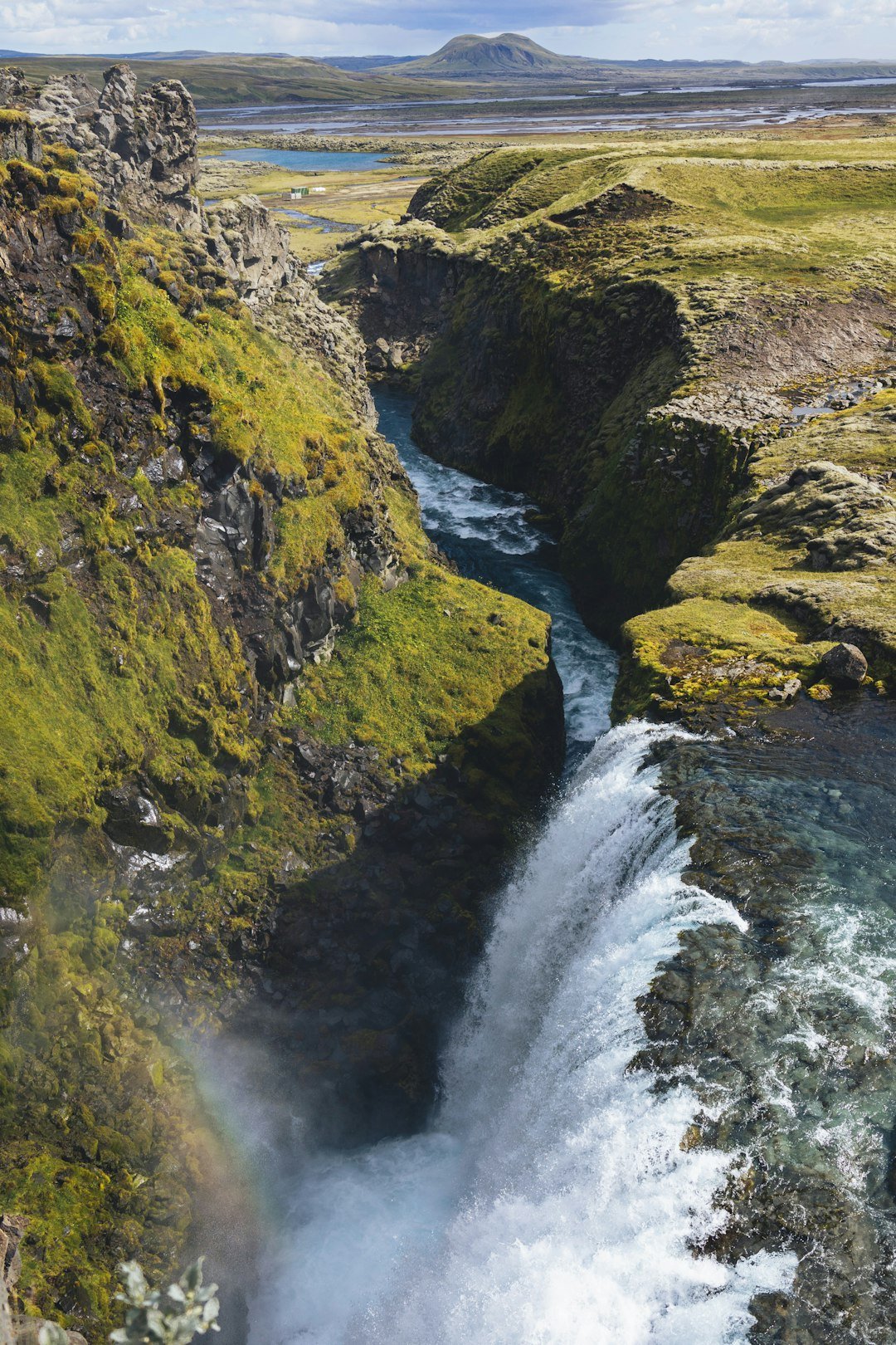 a river flowing through a valley